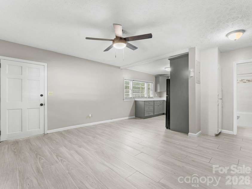71 Harvey Osteen Road, Zirconia, NC 28790.  MLS# CAR4418072, YatesRealty ID 48166. Unit 3 Great Room