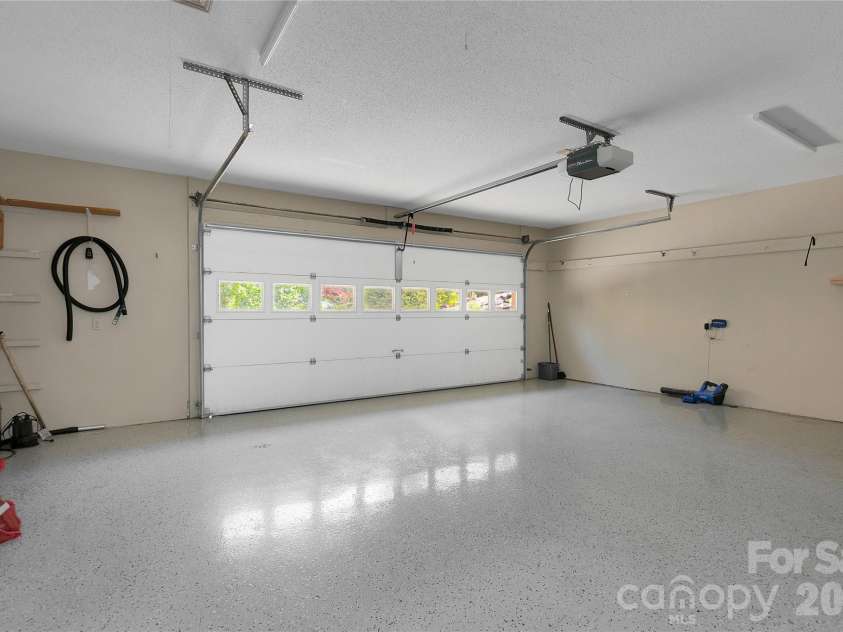 157 Kawani Lane, Brevard, NC 28712.  MLS# CAR4393607, YatesRealty ID 48172. Apoxycrete coating on garage floor