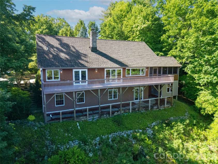 157 Kawani Lane, Brevard, NC 28712.  MLS# CAR4393607, YatesRealty ID 48172. Back of home