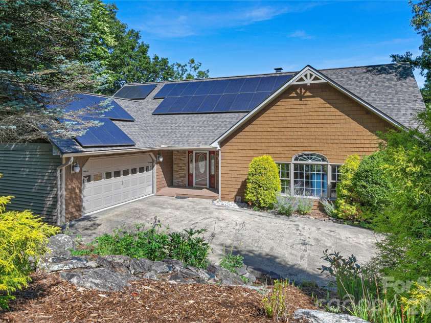 157 Kawani Lane, Brevard, NC 28712.  MLS# CAR4393607, YatesRealty ID 48172. Front of home