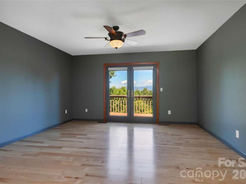 157 Kawani Lane, Brevard, NC 28712.  MLS# CAR4393607, YatesRealty ID 48172. Generous primary bedroom