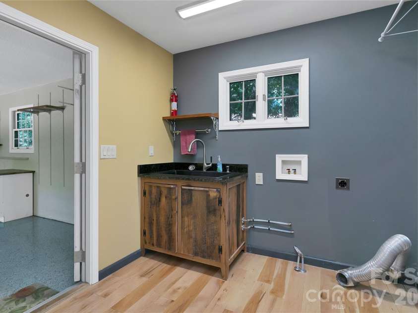 157 Kawani Lane, Brevard, NC 28712.  MLS# CAR4393607, YatesRealty ID 48172. Laundry room
