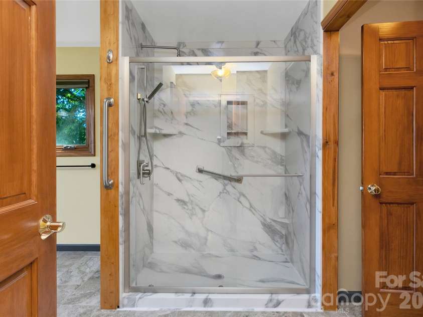 157 Kawani Lane, Brevard, NC 28712.  MLS# CAR4393607, YatesRealty ID 48172. New shower