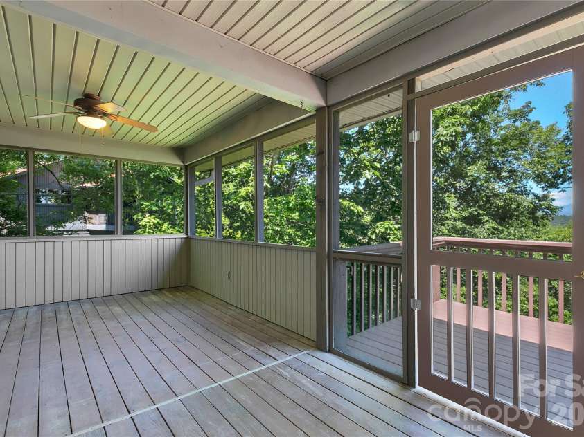157 Kawani Lane, Brevard, NC 28712.  MLS# CAR4393607, YatesRealty ID 48172. Screen porch