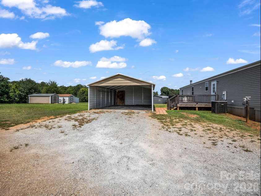 1760 Beachwood Road, Mooresboro, NC 28114.  MLS# CAR4420166, YatesRealty ID 48178. Double Carport