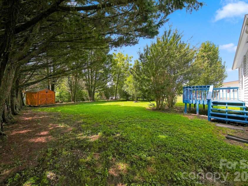 8 Crescent Street, Granite Falls, NC 28630.  MLS# CAR4420234, YatesRealty ID 48179. Back Yard Storage Building