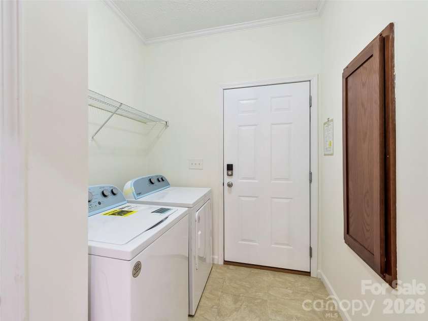 9 Farthings Drive, Arden, NC 28704.  MLS# CAR4419505, YatesRealty ID 48180. Laundry Room