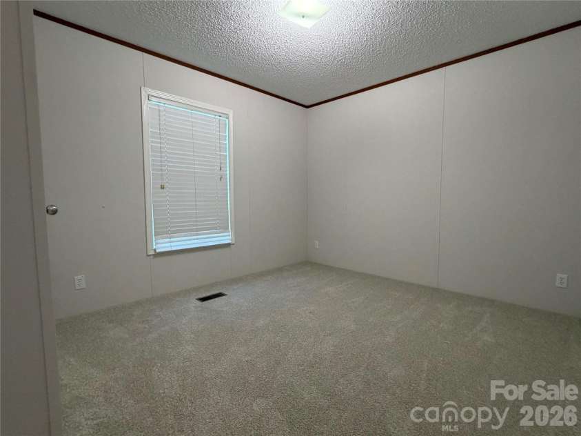 114 Carroll Drive, Cherryville, NC 28021.  MLS# CAR4420483, YatesRealty ID 48183. 