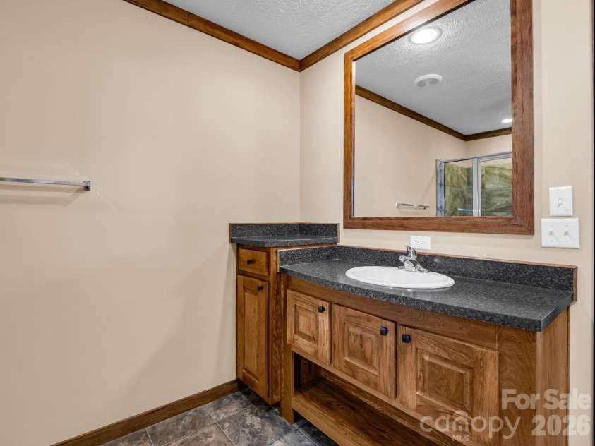 12 Frederick Lane, Hendersonville, NC 28792.  MLS# CAR4418880, YatesRealty ID 48198. Primary Bath - Vanity 2