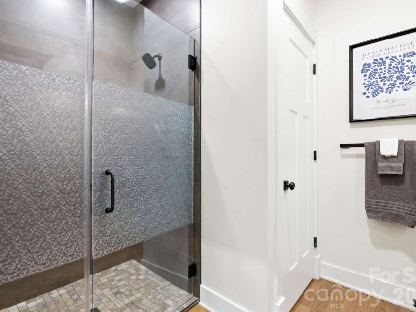 31 Ashbrook Meadows, Fletcher, NC 28732.  MLS# CAR4374375, YatesRealty ID 48210. Bath #2 - glass shower and separate water closet
