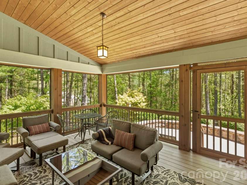 31 Ashbrook Meadows, Fletcher, NC 28732.  MLS# CAR4374375, YatesRealty ID 48210. Covered, screened deck