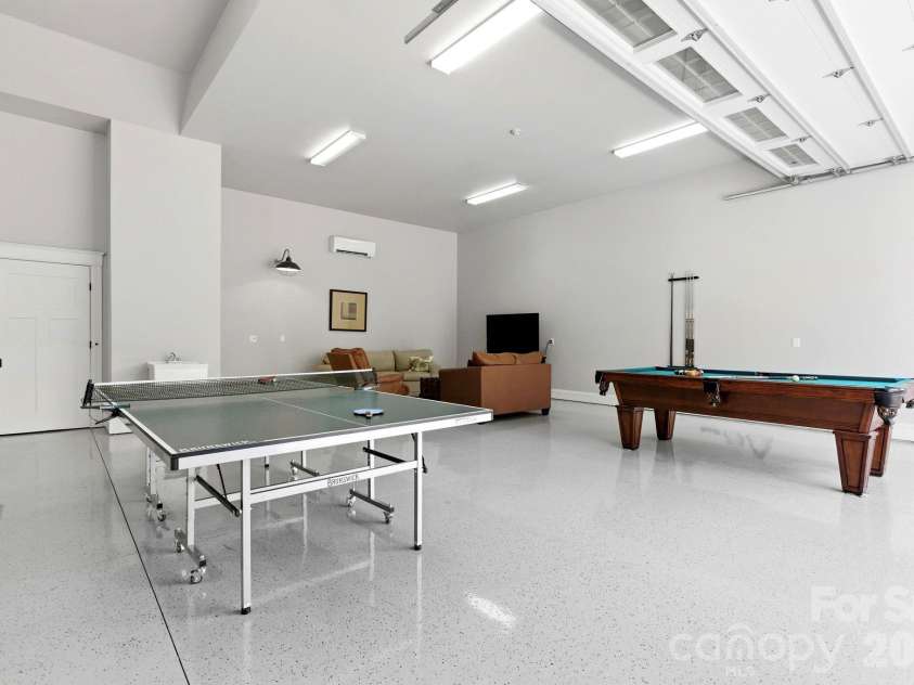 31 Ashbrook Meadows, Fletcher, NC 28732.  MLS# CAR4374375, YatesRealty ID 48210. Epoxy flooring and mini split