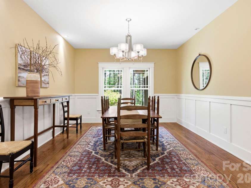 31 Ashbrook Meadows, Fletcher, NC 28732.  MLS# CAR4374375, YatesRealty ID 48210. Formal dining room with decorative millwork