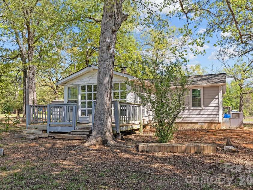 4436 Shiloh Unity Road, Lancaster, SC 29720.  MLS# CAR4420361, YatesRealty ID 48215. Back deck off sunroom
