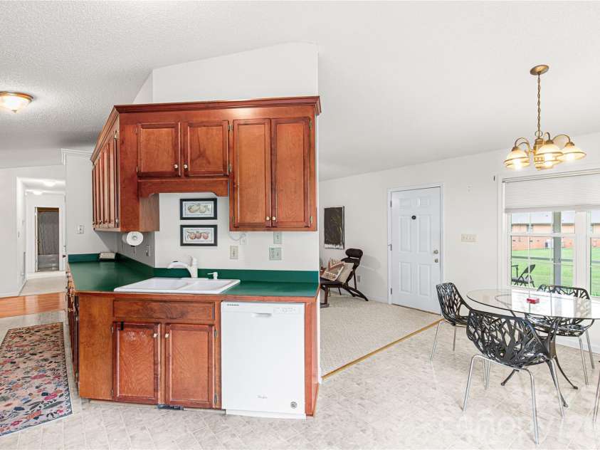 607 Helms Drive, Lowell, NC 28098.  MLS# CAR4419669, YatesRealty ID 48228. 