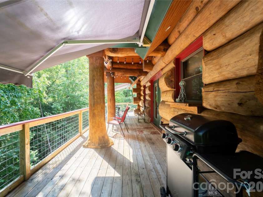 142 Southwood Drive, Brevard, NC 28712.  MLS# CAR4420666, YatesRealty ID 48250. Main level deck