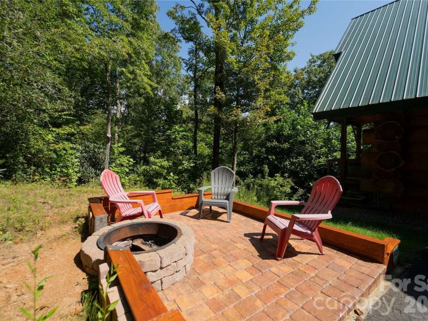 142 Southwood Drive, Brevard, NC 28712.  MLS# CAR4420666, YatesRealty ID 48250. Outdoor firepit