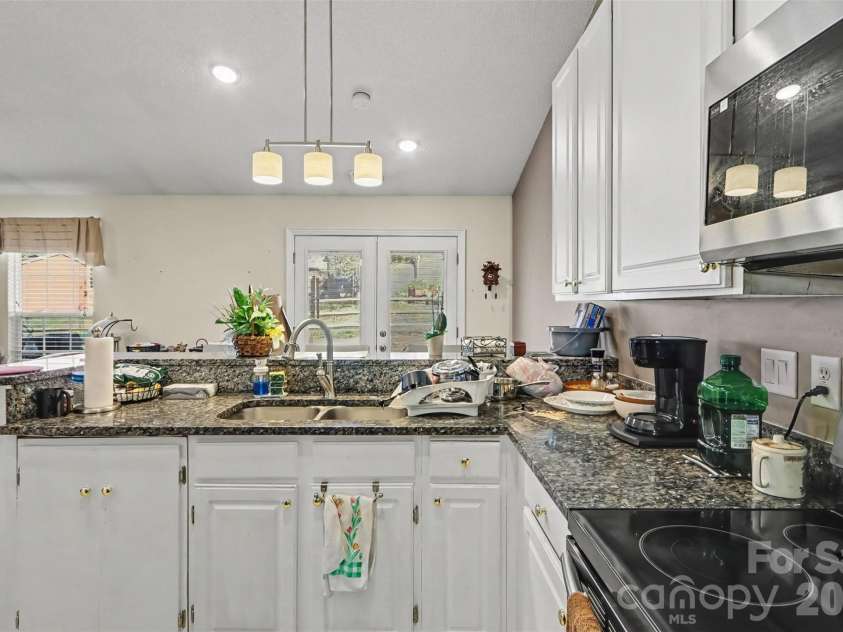 1068 Chapel Creek Road, Concord, NC 28025.  MLS# CAR4416719, YatesRealty ID 48259. 