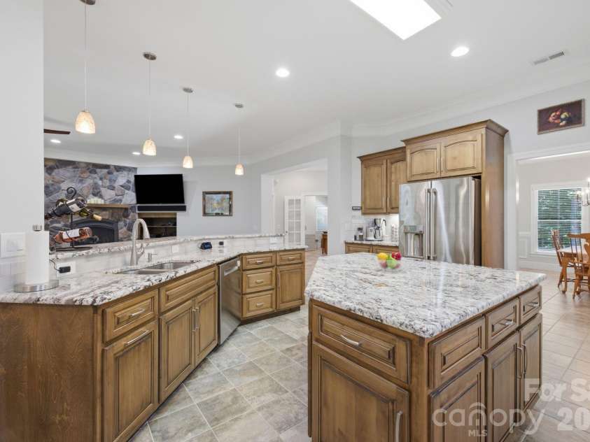 7197 Windy Ridge Drive, Iron Station, NC 28080.  MLS# CAR4417271, YatesRealty ID 48262. Custom furniture style cabinets