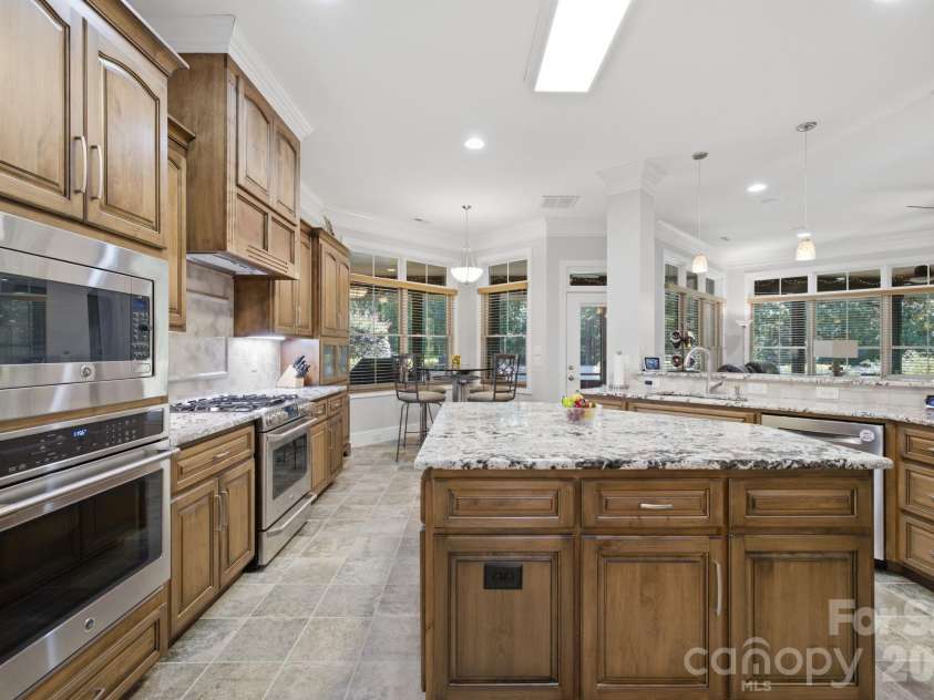 7197 Windy Ridge Drive, Iron Station, NC 28080.  MLS# CAR4417271, YatesRealty ID 48262. Wall Oven and microwave