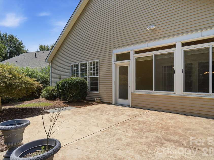 3229 Darlington Road, Charlotte, NC 28105.  MLS# CAR4418773, YatesRealty ID 48263. Back patio