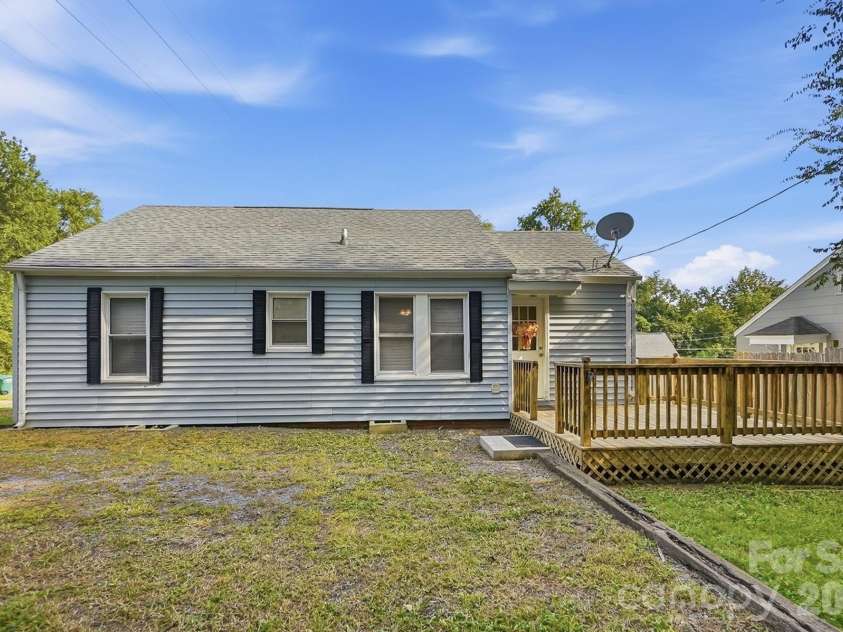 714 Parker Street, Albemarle, NC 28001.  MLS# CAR4419559, YatesRealty ID 48265. Back of the home and back deck