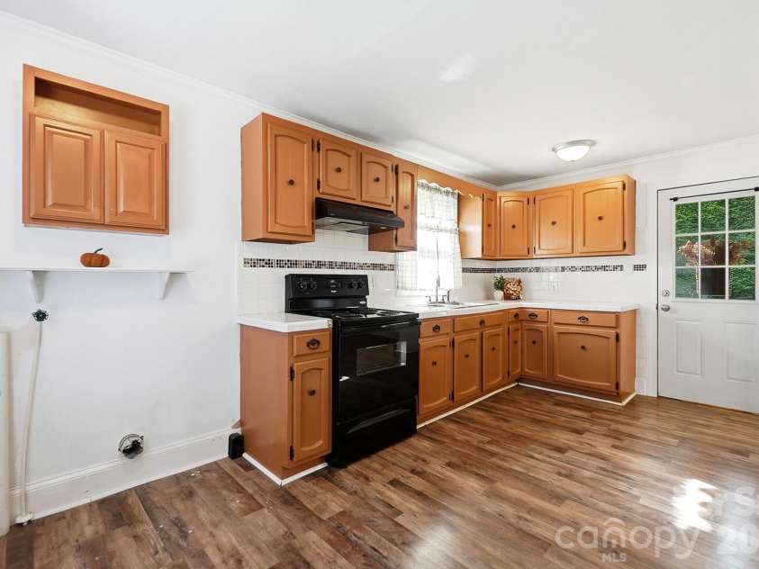 714 Parker Street, Albemarle, NC 28001.  MLS# CAR4419559, YatesRealty ID 48265. Kitchen & Laundry