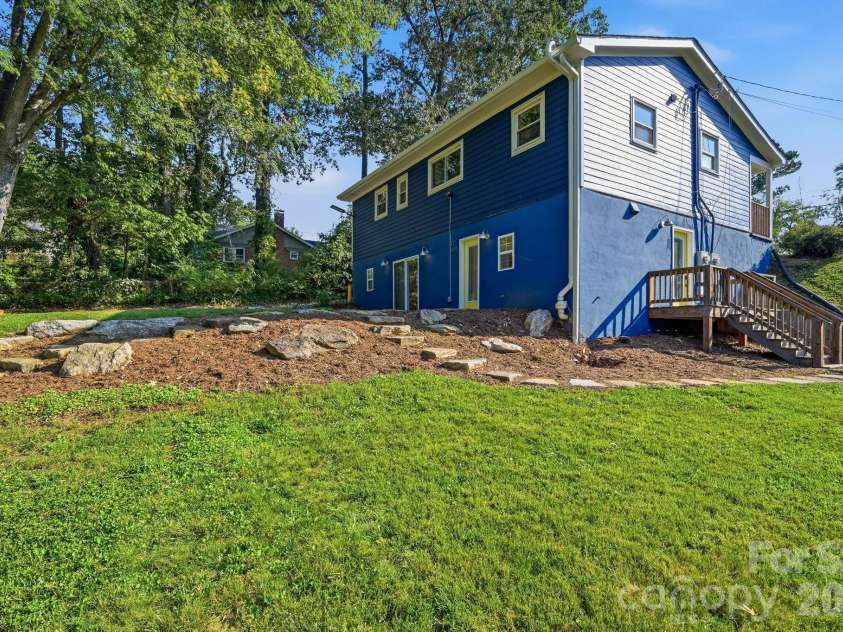 77 Trotter Place, Asheville, NC 28806.  MLS# CAR4419815, YatesRealty ID 48266. Large side and back yard