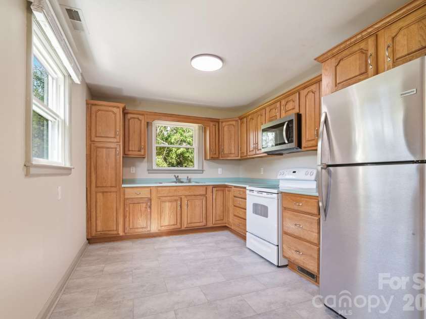 77 Trotter Place, Asheville, NC 28806.  MLS# CAR4419815, YatesRealty ID 48266. Upper unit 2 Kitchen