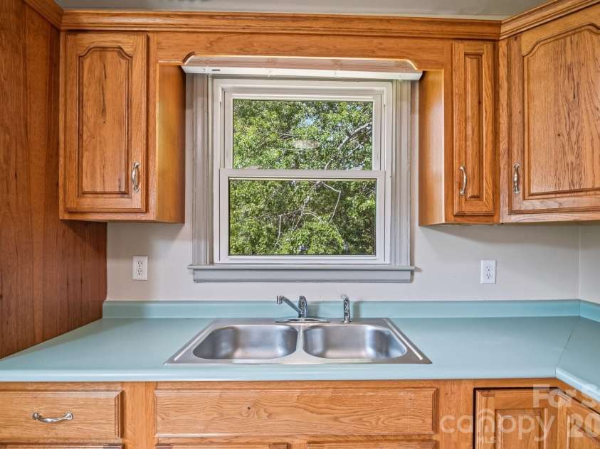 77 Trotter Place, Asheville, NC 28806.  MLS# CAR4419815, YatesRealty ID 48266. Upper Unit 2 Kitchen