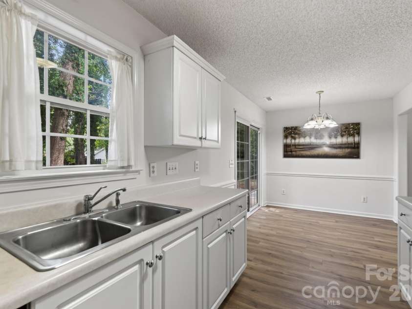 1649 Norfolk Court, Rock Hill, SC 29730.  MLS# CAR4419543, YatesRealty ID 48268. Kitchen to Dining Area