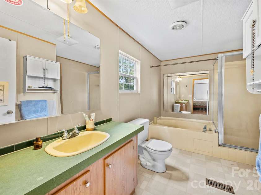 16 Vance Cemetery Road, Weaverville, NC 28787.  MLS# CAR4419349, YatesRealty ID 48269. 