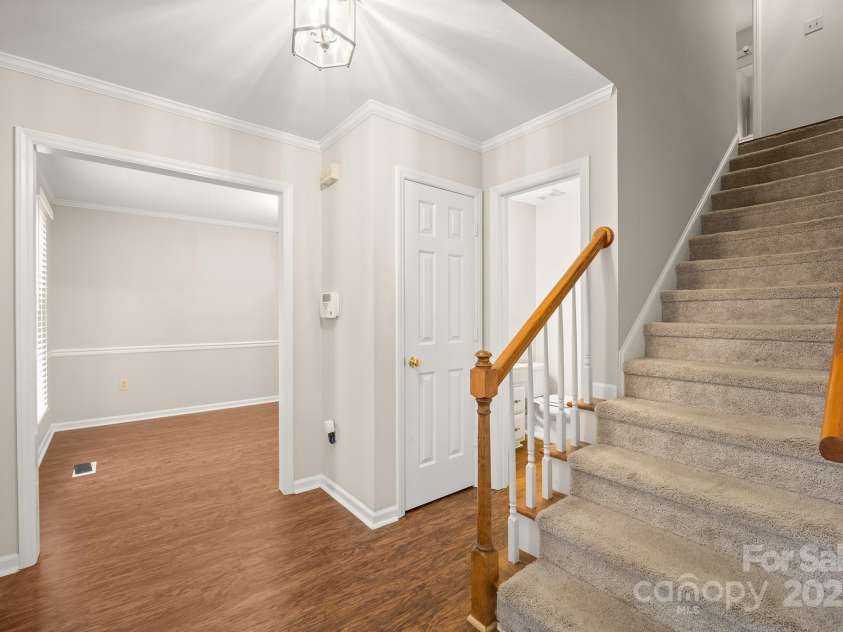 8730 Rittenhouse Circle, Charlotte, NC 28270.  MLS# CAR4225196, YatesRealty ID 4827. Entrance to L Powder Room and Dinning Room
