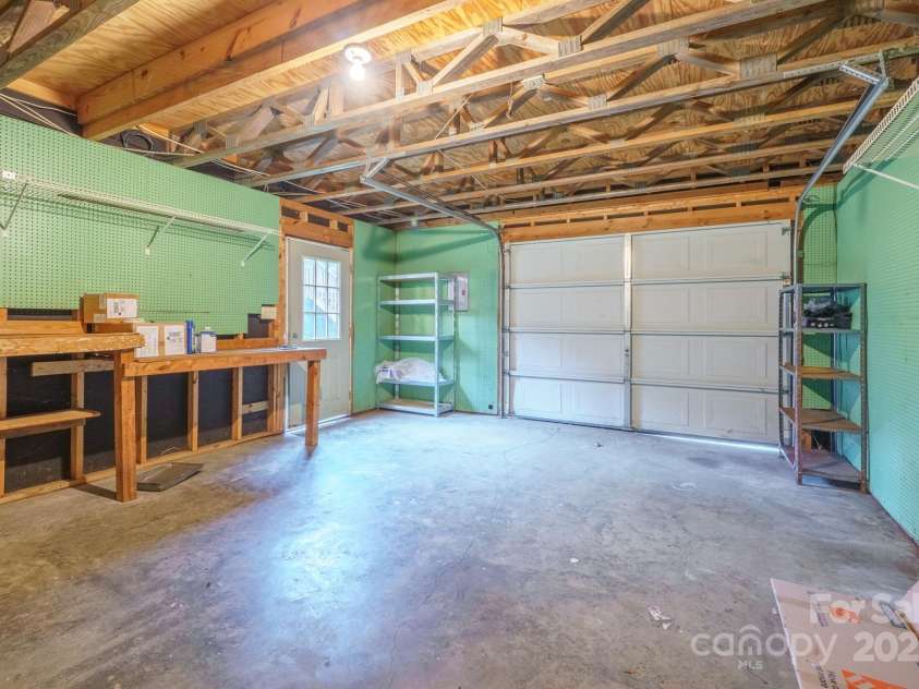 8730 Rittenhouse Circle, Charlotte, NC 28270.  MLS# CAR4225196, YatesRealty ID 4827. Interior Garage