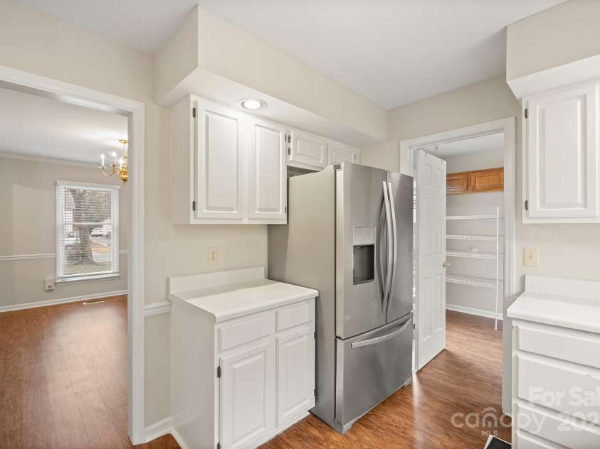 8730 Rittenhouse Circle, Charlotte, NC 28270.  MLS# CAR4225196, YatesRealty ID 4827. Kitchen open to Dining Room