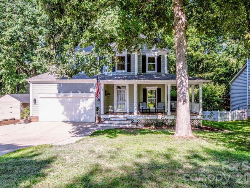 10211 Danesway Lane, Cornelius, NC 28031.  MLS# CAR4410941, YatesRealty ID 48272. Beautiful Cape Cod with a Wrap Around Porch