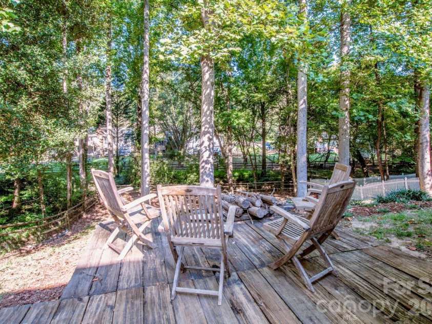 10211 Danesway Lane, Cornelius, NC 28031.  MLS# CAR4410941, YatesRealty ID 48272. Mature trees line this property for ultimate privacy!