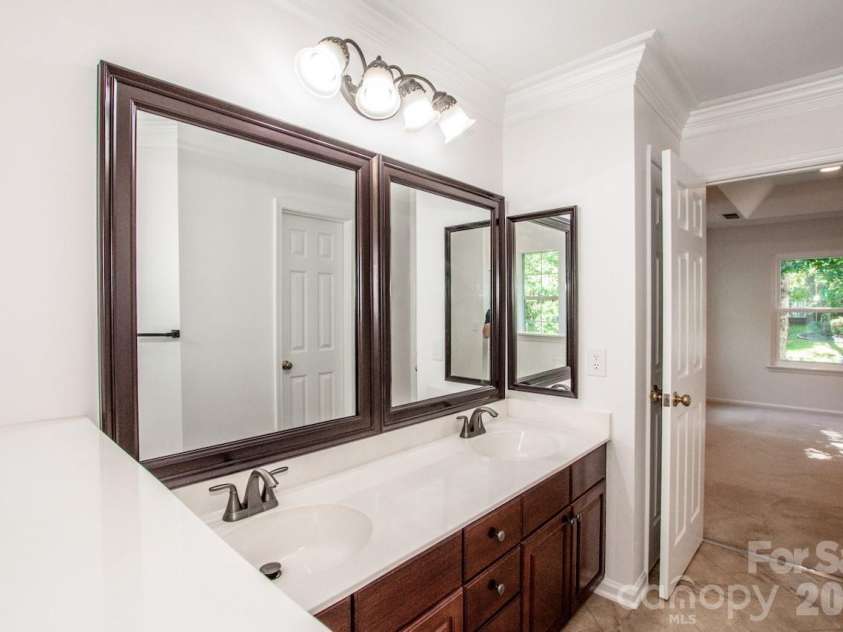 10211 Danesway Lane, Cornelius, NC 28031.  MLS# CAR4410941, YatesRealty ID 48272. Primary Bathroom with double sinks