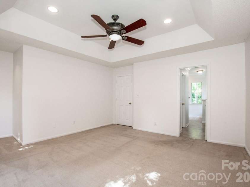 10211 Danesway Lane, Cornelius, NC 28031.  MLS# CAR4410941, YatesRealty ID 48272. Primary Bedroom with Tray ceiling.