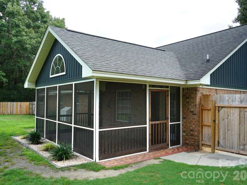 1035 Waterway Drive, Sumter, SC 29154.  MLS# CAR4420215, YatesRealty ID 48276. Covered Screened-In Porch