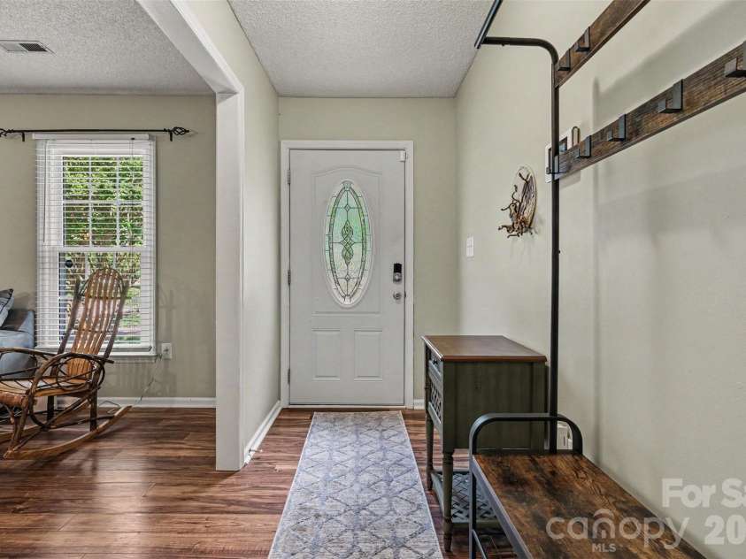 9803 Cooper Run Lane, Charlotte, NC 28269.  MLS# CAR4419711, YatesRealty ID 48278. Entry Foyer