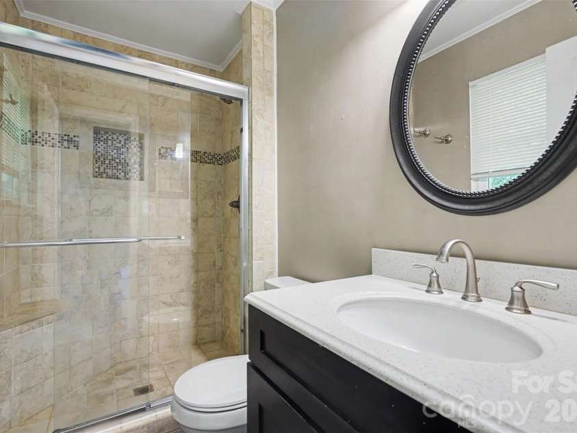 9803 Cooper Run Lane, Charlotte, NC 28269.  MLS# CAR4419711, YatesRealty ID 48278. Primary Bath