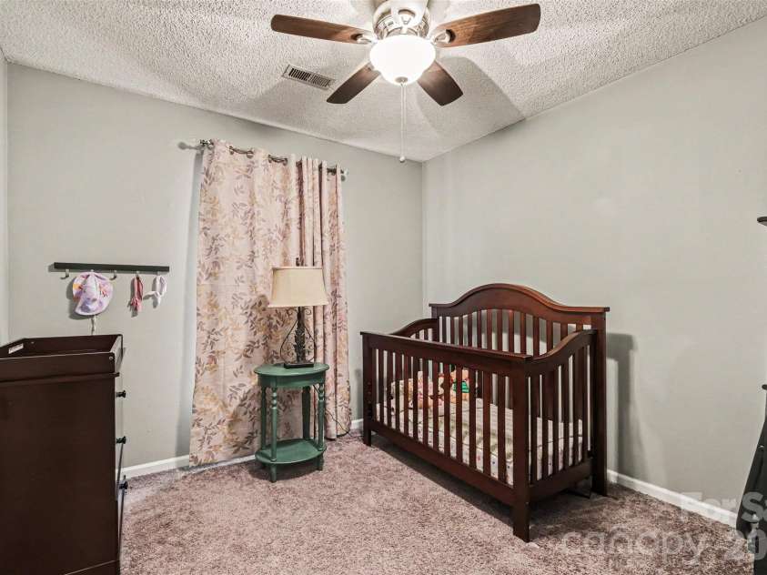 9803 Cooper Run Lane, Charlotte, NC 28269.  MLS# CAR4419711, YatesRealty ID 48278. Secondary Bedroom