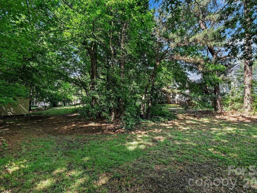 9803 Cooper Run Lane, Charlotte, NC 28269.  MLS# CAR4419711, YatesRealty ID 48278. Serene Backyard