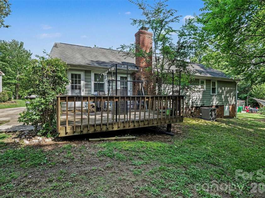 9803 Cooper Run Lane, Charlotte, NC 28269.  MLS# CAR4419711, YatesRealty ID 48278. Wood Deck