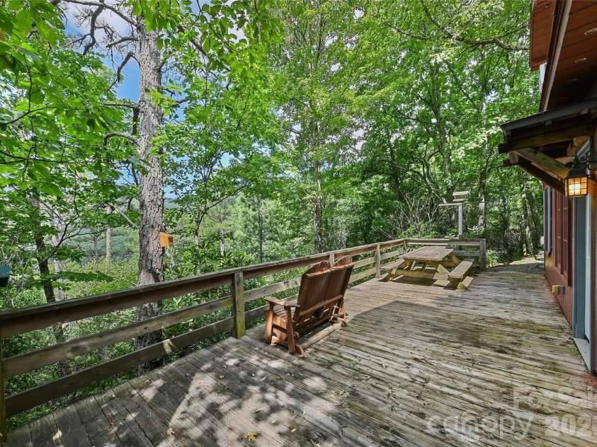 52 Steep Lane, Maggie Valley, NC 28751.  MLS# CAR4397095, YatesRealty ID 48282. Front deck/porch