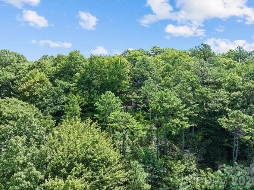 52 Steep Lane, Maggie Valley, NC 28751.  MLS# CAR4397095, YatesRealty ID 48282. Home; as seen from distant drone