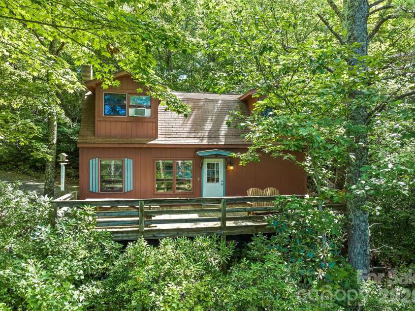 52 Steep Lane, Maggie Valley, NC 28751.  MLS# CAR4397095, YatesRealty ID 48282. Nestled in a natural setting
