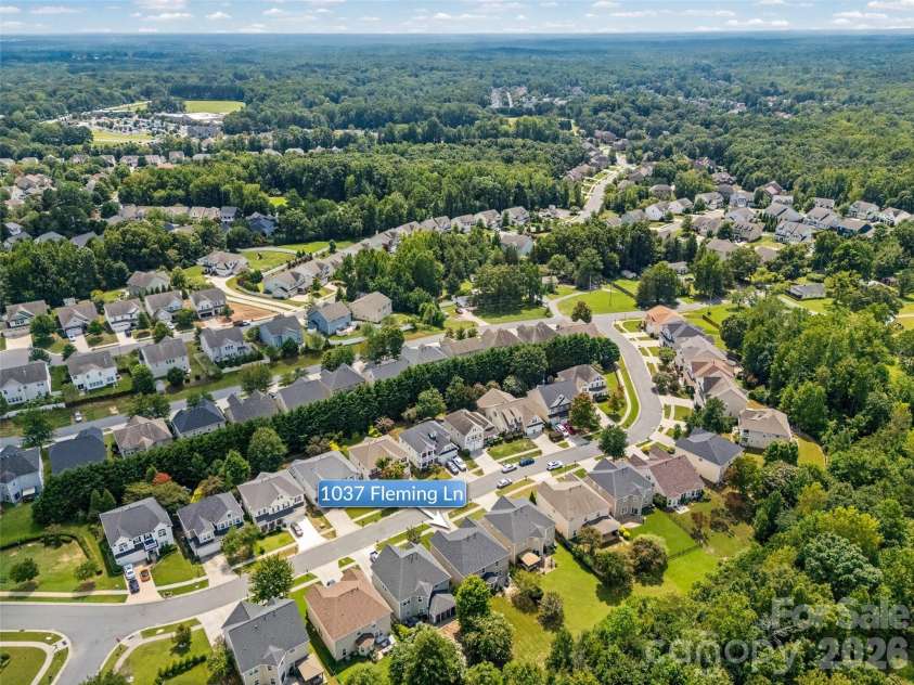 1037 Fleming Lane, Matthews, NC 28104.  MLS# CAR4411578, YatesRealty ID 48286. 