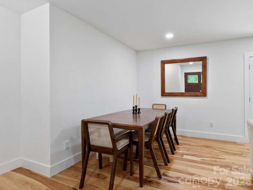 41 Bear Trail, Fairview, NC 28730.  MLS# CAR4420605, YatesRealty ID 48293. Dining area easily accommodates 5-8 people.
